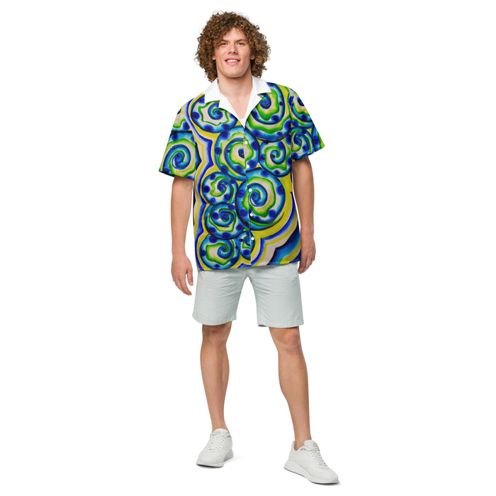 a short sleeve button up shirt with an all over design of blue, green, and yellow spirals