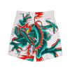 recycled swim trunks with a pattern of a dark green dragon tied up in knots 