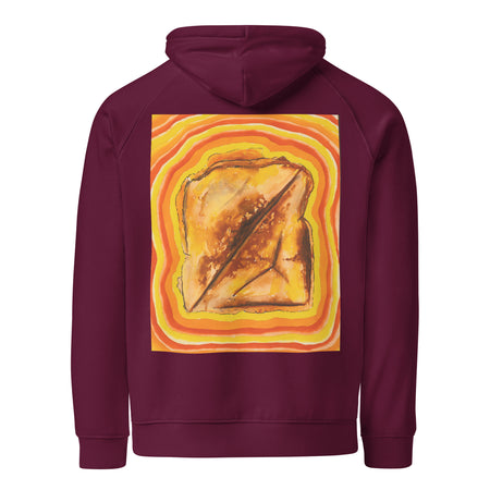 grilled cheese radiating psychedelic bands of reds, oranges and yellows on the back of a maroon hoodie