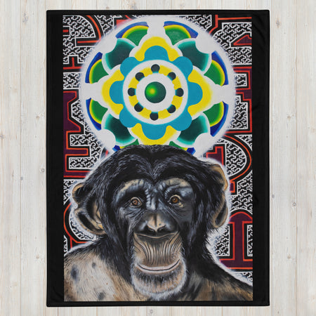 large throw blanket with image of a chimp head with a colorful psychedelic background