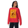 A woman modeling a bright red crewneck sweatshirt featuring a large graphic print of a grilled cheese radiating reds and yellows the front, set against a plain white background
