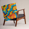 throw blanket with multicolored abstract, geometric imagery