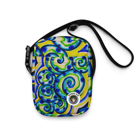crossbody bag with circular watercolor print in aquas and yellows with small circular logo on front
