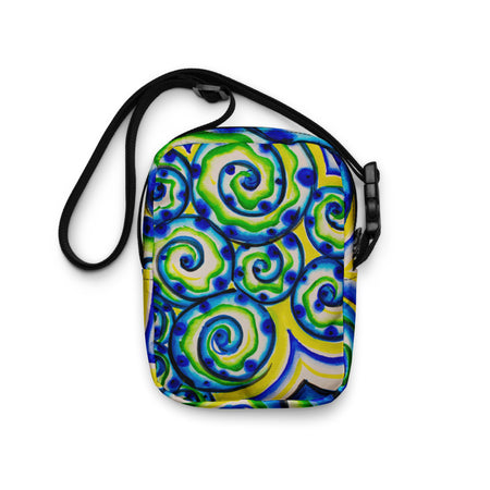crossbody bag with circular watercolor print in aquas and yellows