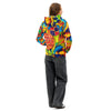 view from behind of a woman wearing an original multi colored psychedelic all over print hoodie in a painterly style