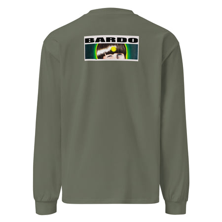 a light green long sleeved t-shirt featuring original art of a sliced avocado showing its pit radiating bands of psychedelic green, light green, and yellow
