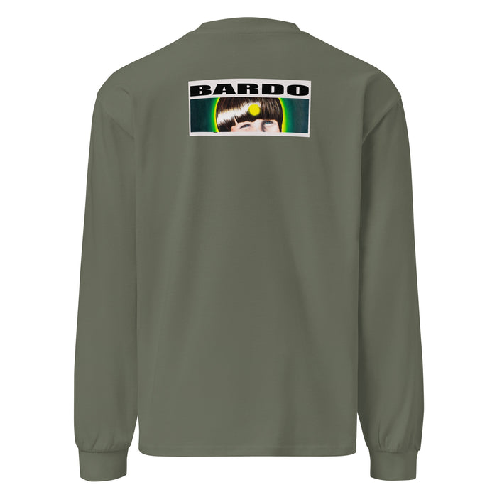 a light green long sleeved t-shirt featuring original art of a sliced avocado showing its pit radiating bands of psychedelic green, light green, and yellow