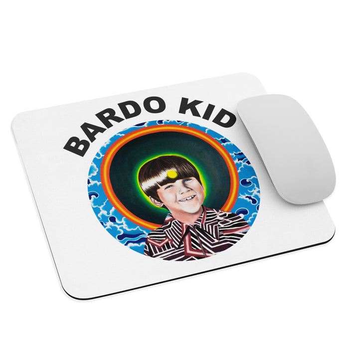 mousepad with the bardo kid logo of a young boy with a psychedelic background