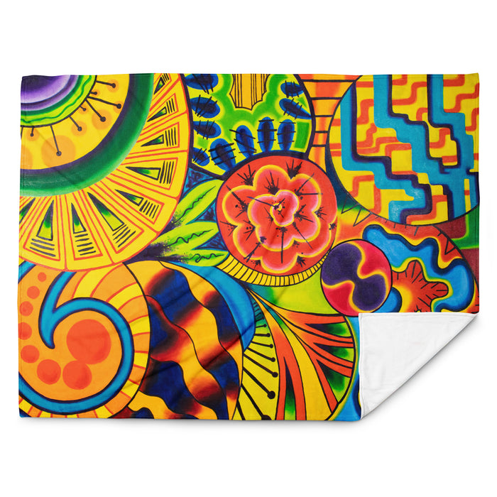 throw blanket with multicolored abstract, geometric imagery