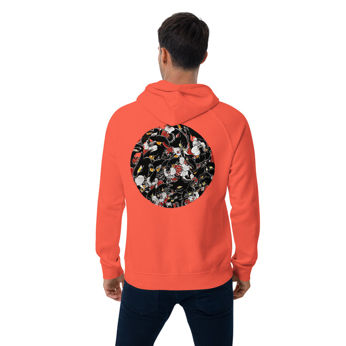 A man viewed from the back wearing a bright coral-orange pullover hoodie with a large circular graphic print on the back. The graphic features a dense collage of classic tattoo black panther heads 