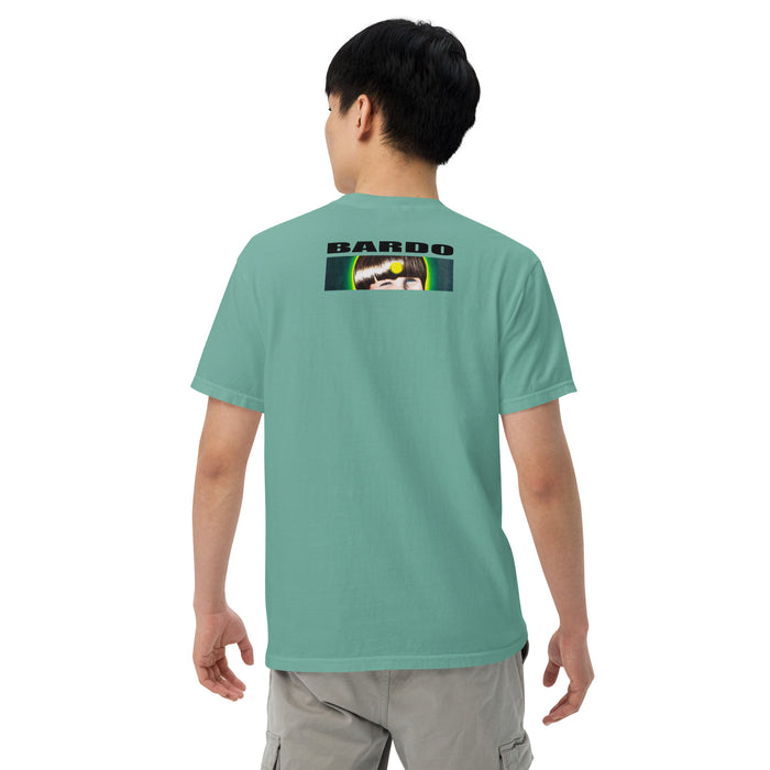 boy wearing a light green t-shirt with distorted cartoon devil head on front and bardo kid logo on back