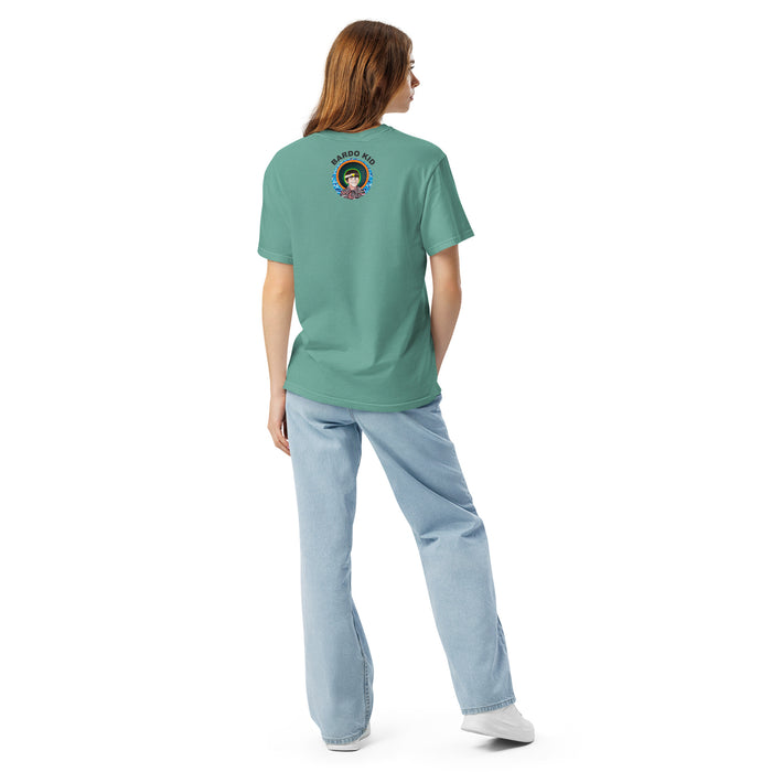 Woman wearing a green t-shirt with a red geometric design on a white background with bardo kid logo on the upper middle back
