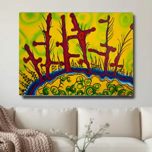 A colorful abstract wall art print hanging above a white sofa in a living room setting. The artwork features stylized red tree-like forms over a bright yellow background with green and blue lower sections.