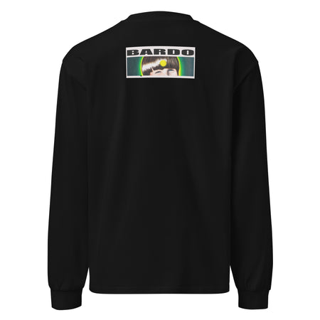 a black long sleeve t-shirt with original art of a peeling banana radiating bands of turquoise, blue, and green psychedelic color.