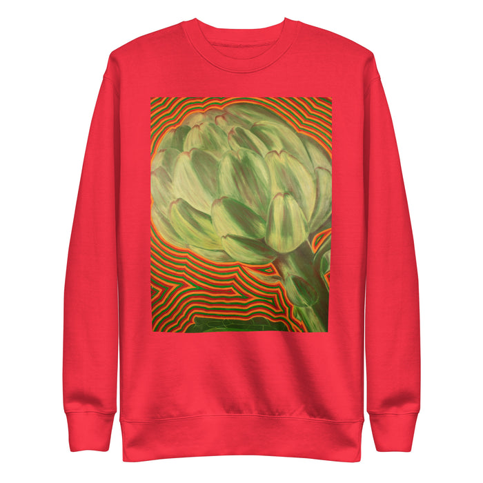 a very bright red orange sweatshirt with an original, full color artichoke radiating psychedelic bands of red, orange, and green around it.