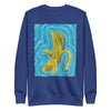 a blue sweatshirt with original art depicting a peeling banana radiating psychedelic waves of turquoise, blue, and green 