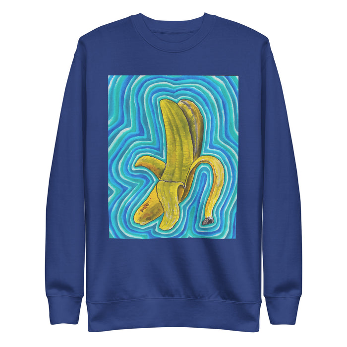 a blue sweatshirt with original art depicting a peeling banana radiating psychedelic waves of turquoise, blue, and green 