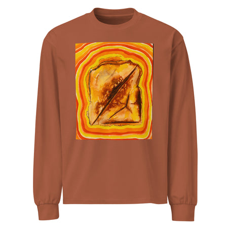 a light brown long sleeve t-shirt with an original piece of art depicting a diagonally cut grilled cheese radiating bands of red, orange, and yellow around it.