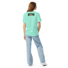 girl wearing a Mint green t-shirt with a colorful mandala design on the front and 'Bardo' logo on the back.