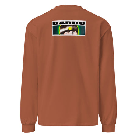 a light brown long sleeve t-shirt with an original piece of art depicting a diagonally cut grilled cheese radiating bands of red, orange, and yellow around it.