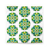 white duvet with an abstract circular repeating pattern made of circles in turquoise, green, and yellow.
