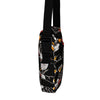 Crossbody bag with a black background and colorful tattoo themed black panther  pattern on a white background