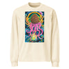 a beige long sleeve t-shirt with original art depicting a pine cone with dangling octopus tentacles, elk antlers, and a Tibetan halo in front of a stormy lightning filled sky.