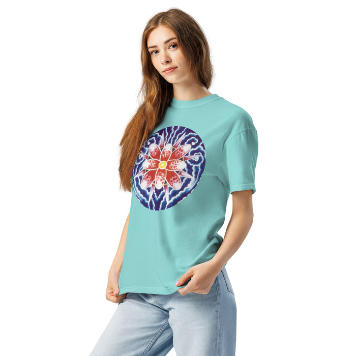  girl wearing a aqua t- shirt with the Bardo Kid logo on the upper middle back and a psychedelic flower design in reds, blues, and oranges on front.