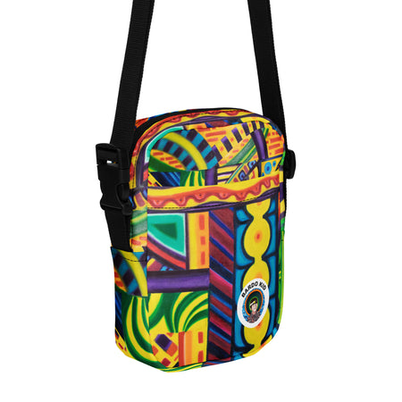 cross body bag with an all over multicolored psychedelic artwork print