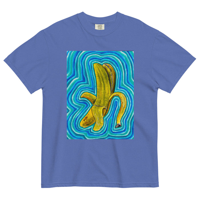 light blue t-shirt with a psychedelic style colorful illustration of a banana radiating turquoise, teal, and blue waves.