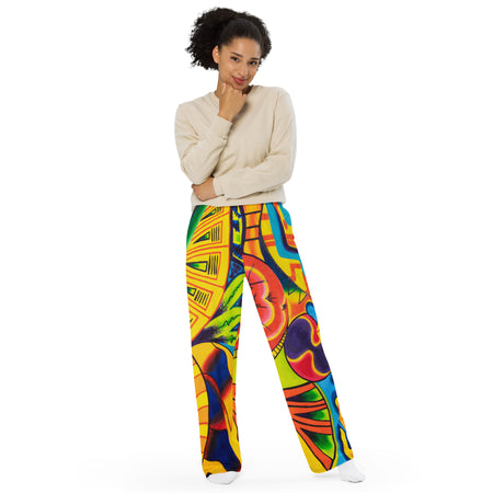 girl wearing soft, comfy lounging pants with all over psychedelic multicolored geometric designs