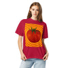 girl wearing a red t-shirt with psychedelic tomato design radiating bands of reds, and oranges