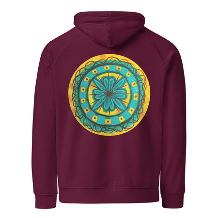 maroon hoodie with a circular mandala design on back on turquoises and yellows
