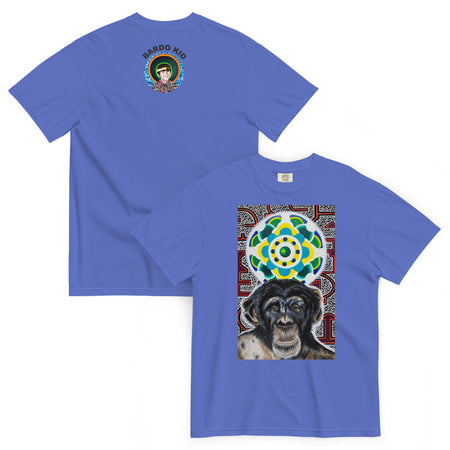 light blue t-shirt with a young chimpanzees face in front of a turquoise, green, and yellow psychedelic mandala with a background illustrated by pulsating geometric red and purple forms