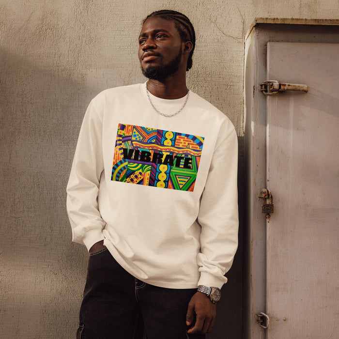 off white long sleeve t-shirt with a multicolored abstract design contained within a rectangle with the word vibrate written across itct