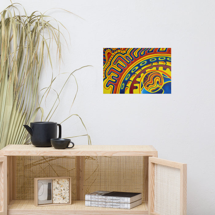 geometry based psychedelic painting in reds, blues, oranges, and yellows using circles and arcs on a living room wall